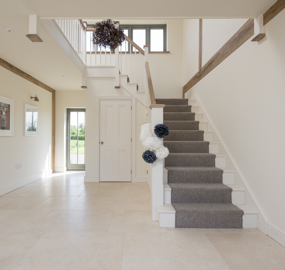 Create a warm welcome to your home with stone flooring